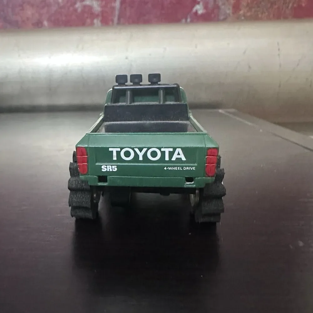 Schaper Stomper 4x4 Toyota SR5 Green Pickup Truck Works